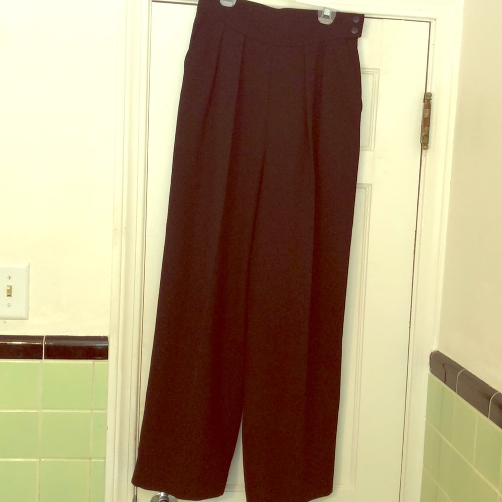 Beautifully tailored black gaberdine pants.